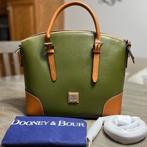 Dooney & Bourke Green smooth leather handbag with tan leather trim. NWOT dustbag